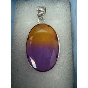 Bi-color tourmaline pink/yellow large silver-tone artisan made pendant.
